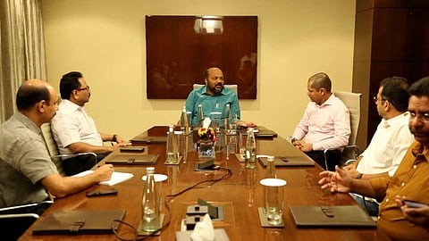 Industry Minister P Rajeeve holding discussions with IBM India's senior vice-president (products) Dinesh Nirmal in Kochi on Tuesday. Industry department principal secretary Suman Billa (left).