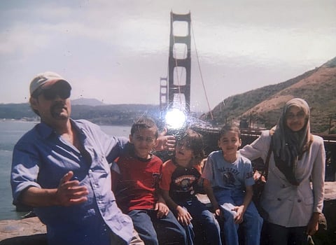This undated image provided by Fadi Sckak shows a family photo of Abedalla Sckak with his wife Zahra Sckak and children. Abedalla died after being shot in the fighting in Gaza last month. (Photo | AP)