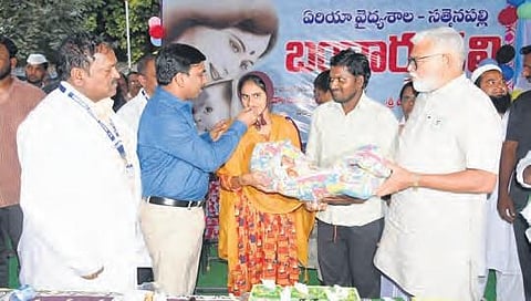 Collector celebrating the birth of a baby girl at a hospital in Palnadu I Express
