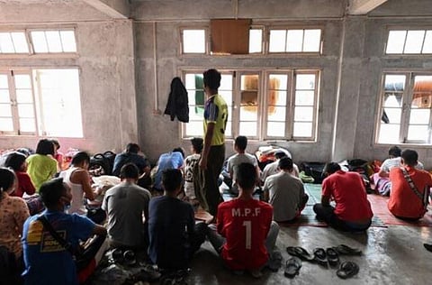 Refugees who fled Myanmar and crossed illegally to India, sit in a temporary shelter at an undisclosed location in India's northeastern state of Mizoram in 2021. (File Photo | AFP)