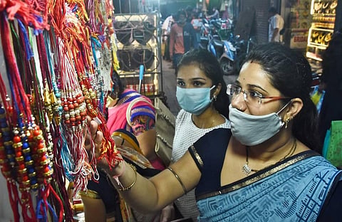 Girls seen buying rakhi threads in Chennai's Sowcarpet area ahead of Raksha Bandhan. (Photo | Ashwin Prasath, EPS) 