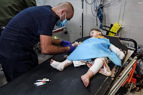Injured Palestinians evacuated from Indonesian hospital in north of the Gaza Strip receive care at Nasser hospital in the Palestinian territory's southern city of Khan Yunis on Nov 20, 2023. (AFP)