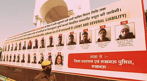 Banners displaying accused