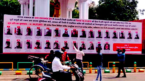 Banners displaying anti-CAA protesters