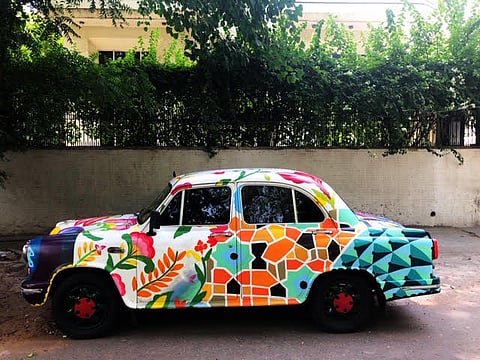 Malhotra's 2009 Model Ambassador with Senkoe's Art