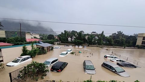 cars getting submerged in floods