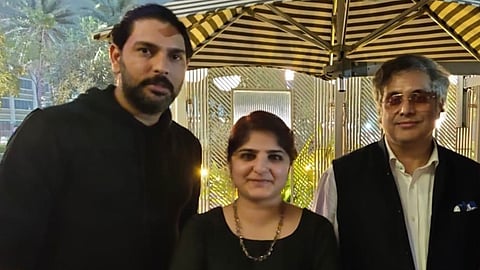 Yuvraj Singh with Trust Legal Partners Petal Chandhok and Sudhir Mishra