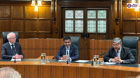 CJI Chandrachud (centre) with UK Supreme Court President, Lord Reed (L) and Senior Advocate Gourab Banerji (R)