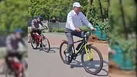 Madhya Pradesh HC Justice Dwarka Dhish Bansal cycles to court
