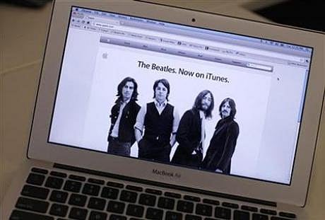 Eversheds advises Beatles to go eat the Apple and play iTunes