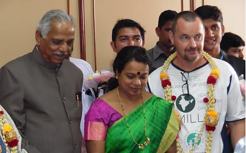 Chris Parsons felicitated at Karnataka Legislature after completing 30-day charity walk