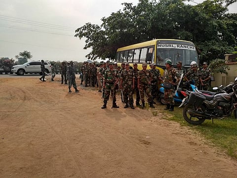 Security forces deployed on the NUSRL campus in September last year