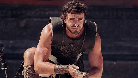 Paul Mescal ate a lot of chicken, and lifted heavy things to get ripped for Gladiator II