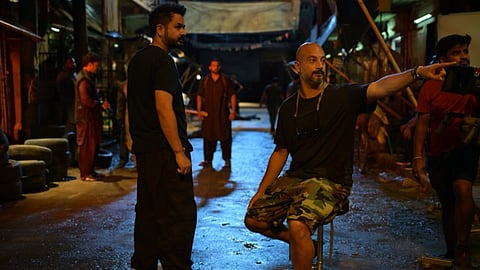 Aditya Dhar and cinematographer Vikash Nowlakha on sets of Dhurandhar 
