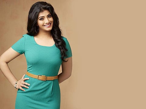 Varalaxmi to share screen space with dad