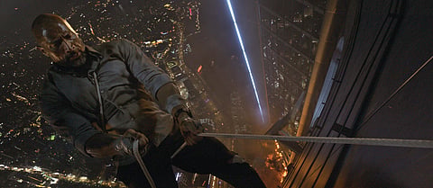 Skyscraper Review: An underwhelming, sombre Dwayne Johnson show