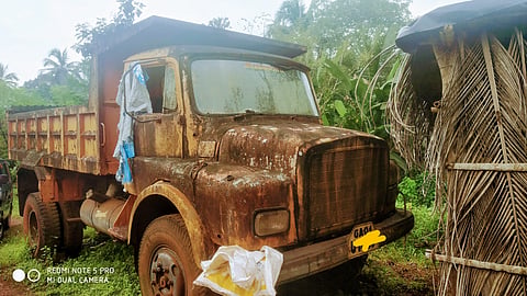 Goa : Rusty mineral transport truck in Curchorem Goa.