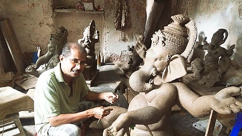Arun Palyekar making Ganesh idol, In Kharebandh, Pernem - Goa. On Saturday, 31 July, 2021. 