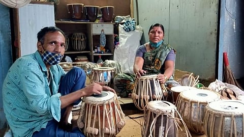 Woman from Goa repairs leather instruments with her husband 