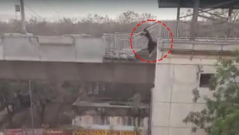 crime news 21 year old woman cctv footage jumped off from sr nagar metro station hyderabad telangana