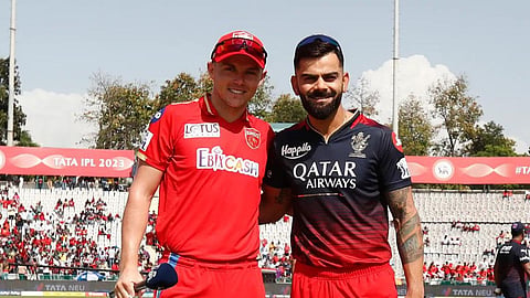 Sam Curran and Virat Kohli