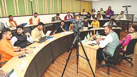 Siddhesh Naik presiding over the Adarsh Parliament of IIDL