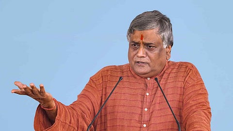 Anil Dhir 