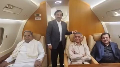 Karnataka CM Siddaramaiah minister Zameer Ahmed Khan private jet 