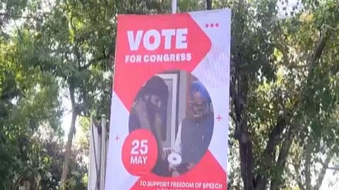 Yasin Malik Poster With Former PM Manmohan Singh