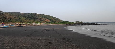 Small pieces of coal and oil were flowing come on shores of Karanjale