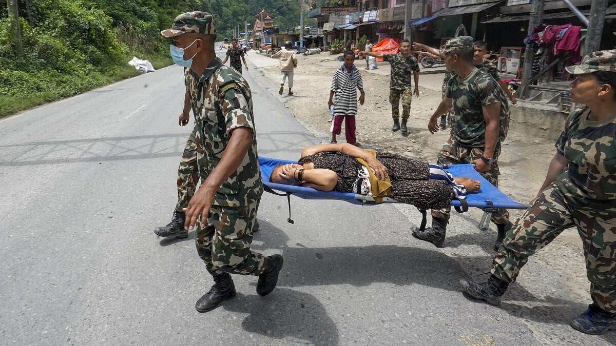 Nepal on alert as water dam bursts again, fresh flood threat looms