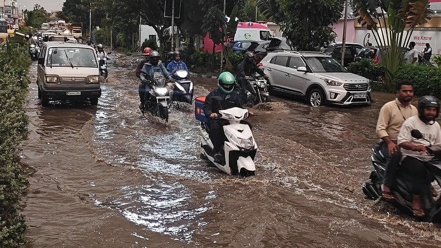 Sudden downpour causes waterlogging and slow traffic across Bengaluru
