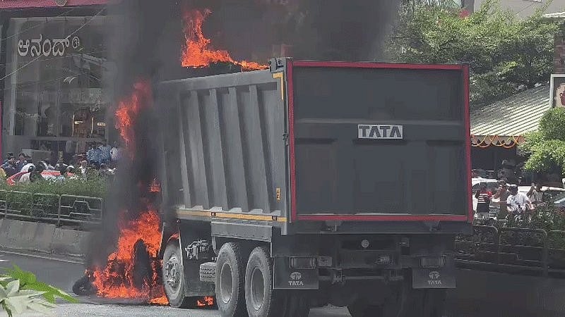 Lorry catches fire after collision with biker on Kanakapura Main Road