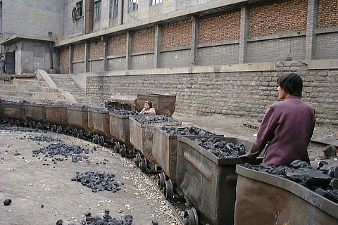 Decoupling economic growth from resource use is important. Credit: LHOON/ Flicker
