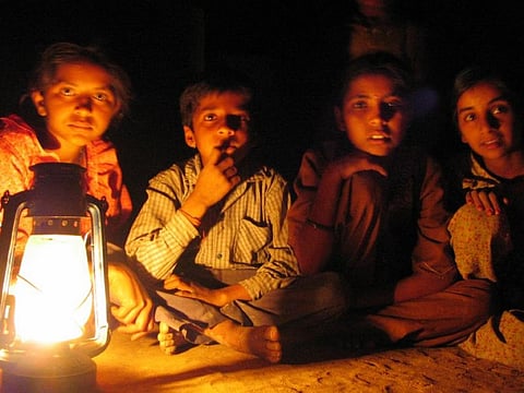 Students have no other option but to use chimney or solar lamps to study. Credit: Ariel T / Flicker
