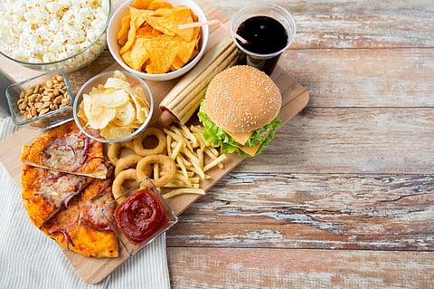 Junk foods almost always use more energy, but land and water use vary between products (Credit: iStock)