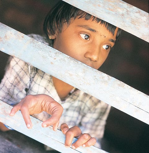 In 2001, when Down To Earth
visited Kasargod, seven-yearold
Shruti could not go to
school, even though it was
100 metres from her house
in Vaninagar area of Padre
village. She was born with
three deformed limbs (Photo: Yajneshwara Acharya)