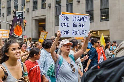 A protester at a climate change march in New York, USA (Credit: iStock) 