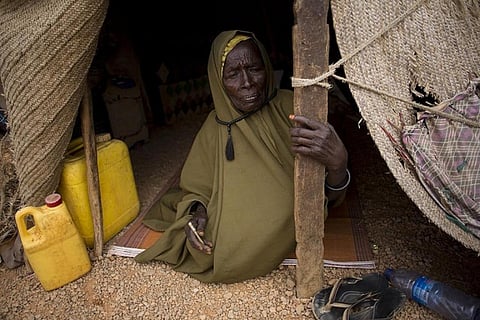 An old woman sits near the doorway of her hut at a camp for internally displaced people at Uusgure village, Puntland, Somalia. Pastoralists have moved in these camps after losing their livelihood due to the current drought. Nearly 3 million people are estimated to be severely food-insecure and at risk of famine in north-eastern Nigeria, Somalia and South Sudan where famine has already been declared

Credit : FAO/Karel Prinsloo 