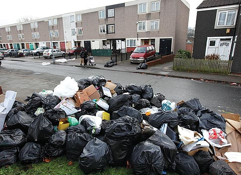 Piles of garbage along the streets became  a common sight in the UK after China banned importing plastic waste (Credit: Reuters)