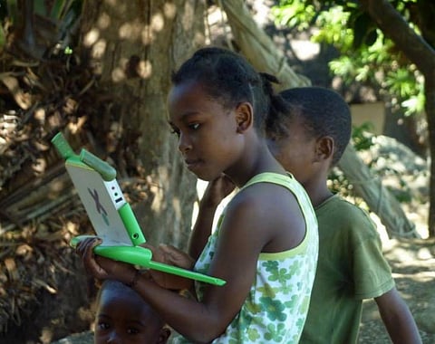 A Malagasy girl works on her laptop. http://www.nosykombaproject.org/gallerie-photos/
