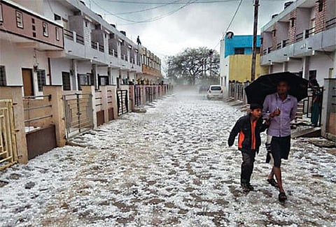 A road in Neemuch district, Madhya Pradesh, paved with hailstones in March (COURTESY: BHOPALTIMES.COM)