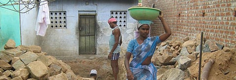 Construction workers in Tamil Nadu     Credit: Wikimedia Commons