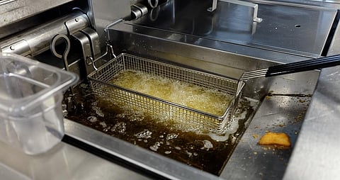 Frying potatoes in a fast food restaurant. Credit: Getty Images