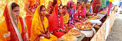 Women showcase their expertise in making 'peetha' sweets at a PEETHA camp. Credit: Priya Ranjan Sahu  

