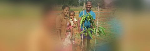 Lalita Bhengra with her family inside the orchard. Photo: Debmalya Nandy