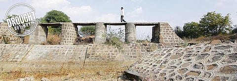 The old check dam on the Rawai in Maharashtra's Hangewari village lies defunct. The government, instead of repairing it, has built a new check dam on the rivulet under the government's Jalyukt Shivar Abhiyan just before it enters the village. Its faulty design and location has now blocked the river flow (Photographs: Adithyan PC)
