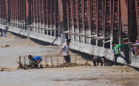 The Yamuna had crossed the 207 metre mark in Delhi in 2013 as shown in this photo of the Old Bridge. This time, the levels could be much higher, worry officials. Photo: Vikas Choudhary/CSE