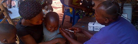 A child being vaccinated against measles in the DRC. Photo: Flickr