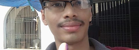 A young voter showing indelible ink on his finger after casting his vote in Odisha. The state government decided to stamp migrants returning to Odisha with indelible ink Photo: Ashis Senapati